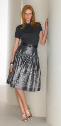 Matalan skirt and top. Half sleeve gathered roll neck &pound;6, belt &pound;3, embellished peplum skirt &pound;16, metallic cross strap heels &pound;14.